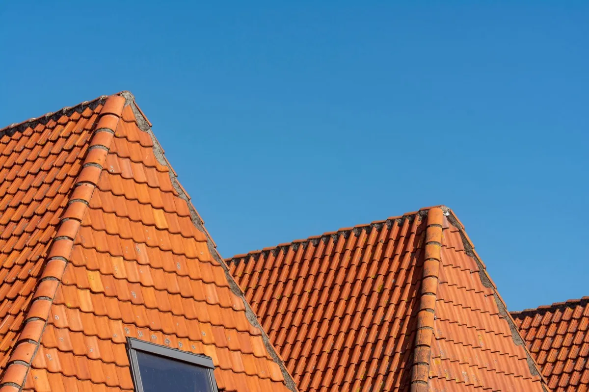 Clay barrel tile rooflines on homes in Bloomington, IL