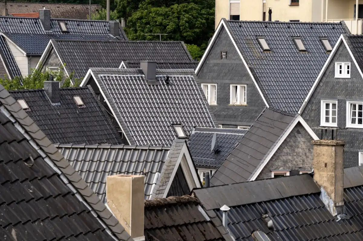 Steep roof eaves and gutter lines on houses in Bloomington, IL